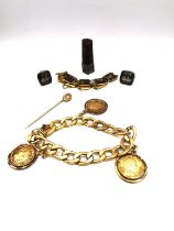 A collection of jewellery, including a gold plated Murat curb link bracelet with coin charms, a