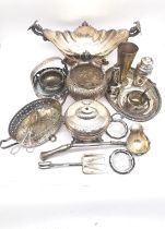 A large collection of silver plated items to include a table centrepiece with Roman dolphin handles,