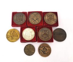 A collection of bronze commemorative coins/medals to include a Flyweight dated 1961, Junior Foil