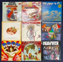 A collection of rock and pop compilation albums. (9)