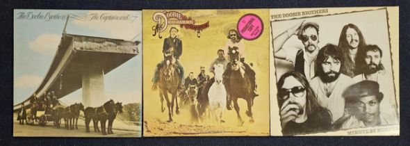3 albums from the Doobie Brothers including a promo copy of 1975s Stampede. (3)