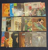 A mixture of harder rock and easy listening LPs. (23)