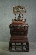 † Burmese lacquered and gilded temple bell and bible box. H.173 W.80 D.70cm.