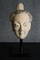 † A 19th century Chinese ceramic head, Sichuan province. H.48cm.