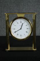 † A mid century Tiffany & Co. gold plated mantel clock. H.24 W.20 D.8cm.