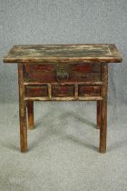 † A 19th century Chinese elmwood side table. H.86 W.93 D.51cm.