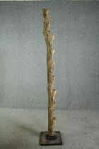 † A carved hardwood granary ladder, 20th century, West African, Dogon tribe. H.214cm.