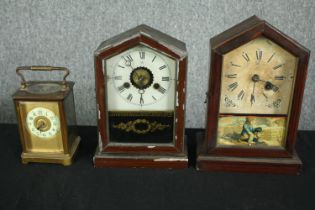 Two early 20th century American painted shelf clocks with decorative glass panels, together with a
