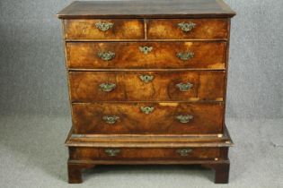 A George I walnut chest on stand. H.111 W.105 D.57cm.