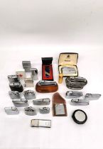 A collection of 23 vintage lighters and one case, to include a boxed Varaflame and four similar, two