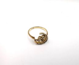 A Victorian yellow metal (tests as 9ct) diamond set crescent and clover ring inset with diamonds and