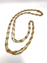 A French 19th century 18ct yellow gold fancy link muff chain with C-sprung clasp. Stamped with