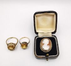 A collection of three antique yellow metal (tests as 9ct) yellow gold rings, two dress rings set