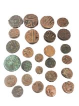 A collection of twenty six ancient coins and tokens, including African, Indian and Roman.
