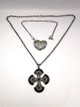 A silver Celtic cross pendant and chain set with garnet, marcasite and pearl along with a cubic