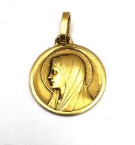 Firmin-Pierre Lasserre, an 18ct yellow gold French religious pedant of Mary Magdalene, signed P.