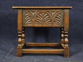 A 17th century style oak stool, 19th century, converted with a later hinged lid.