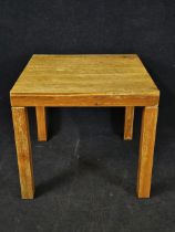A pine and teak garden table. H.74 W.80 D.80cm.