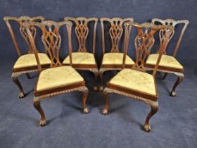 A set of six George II style carved mahogany dining chairs, 20th century. H.102