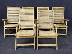A set of six teak garden recliners