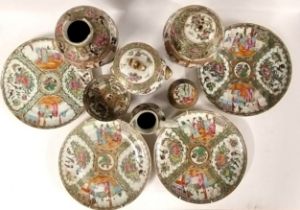 A group of Chinese hand painted export porcelain wares, including vases, jugs, bowls and plates.
