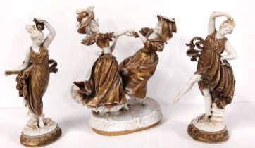 A group of three early 20th century Capodimonte white and gilded porcelain figural dancing groups.