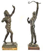 After the antique, 'The Dancing Faun', bronze on a marble base, together with 'The Archer' after
