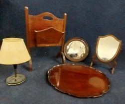 A George II style mahogany tray, a magazine rack, shield dressing table mirror, another mirror and