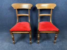 A pair of 19th century mahogany Trafalgar back dining chairs