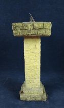 A weathered stone sundial on pedestal base. H.84 W.36 D.36cm.