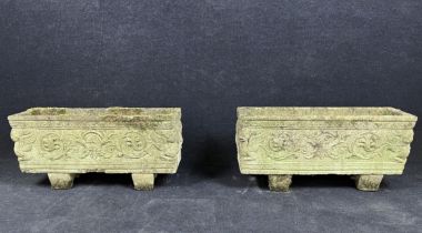 A pair of weathered composition stone garden troughs. H.35 W.71 D.24cm.