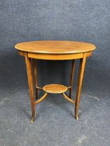 An Edwardian mahogany, crossbanded and string inlaid occasional table. H.70 W.66 D.45.5cm