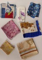 A group of seven various silk scarves, one hand painted Japanese and one with an abstract design,