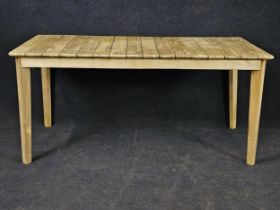 A 20th century teak dining table, with a slatted top. H.75 W.160 D.80cm.