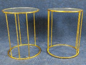 A pair of gilt metal side tables with mirrored tops. H.46 Dia.35.5cm.