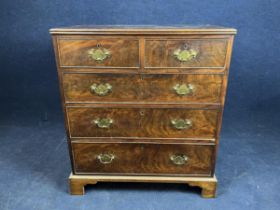 A George II style walnut chest of drawers, 19th century. H.92 W.81 D.51.5cm