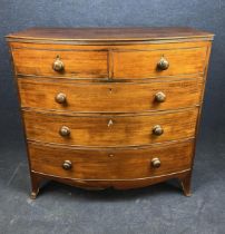 A Victorian mahogany bow front chest of drawers. H.106 W.107 D.55cm