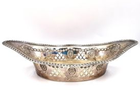 A pair of Victorian Goldsmiths and Silversmiths Company silver pierced boat shaped bon bon dishes