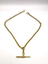 A Victorian 18ct yellow gold albert pocket watch chain, with sliding T-bar and albert clasp. Each