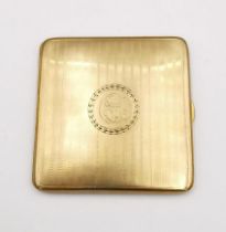 A 9ct yellow gold engine turn decorated and engraved cigarette case. Laurel wreath cartouche to