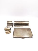 A collection of Victorian silver, including a Silver Asprey desk holder with three slots and a