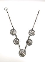 A Victorian silver belcher chain articulated necklace with five silver pierced plaques (converted