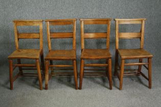 Four late 19th century elm seated chapel chairs. H.79cm. (Each).