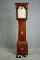 A late 18th century mahogany eight day longcase clock, with Sheraton style urn and fan inlay, the