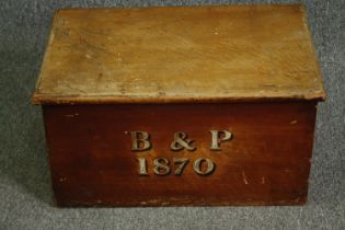 A 19th century pine trunk, the front painted with 'B&P 1870'. H.30 W.55 D.36cm.