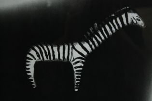 A mixed media, stylized Okapi or Giraffe, framed and glazed. H.45 W.51cm.