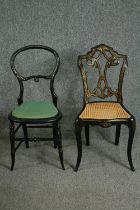 Two Victorian japanned side chairs, one with an ornate splat back and caned seat. H.84cm. (largest).