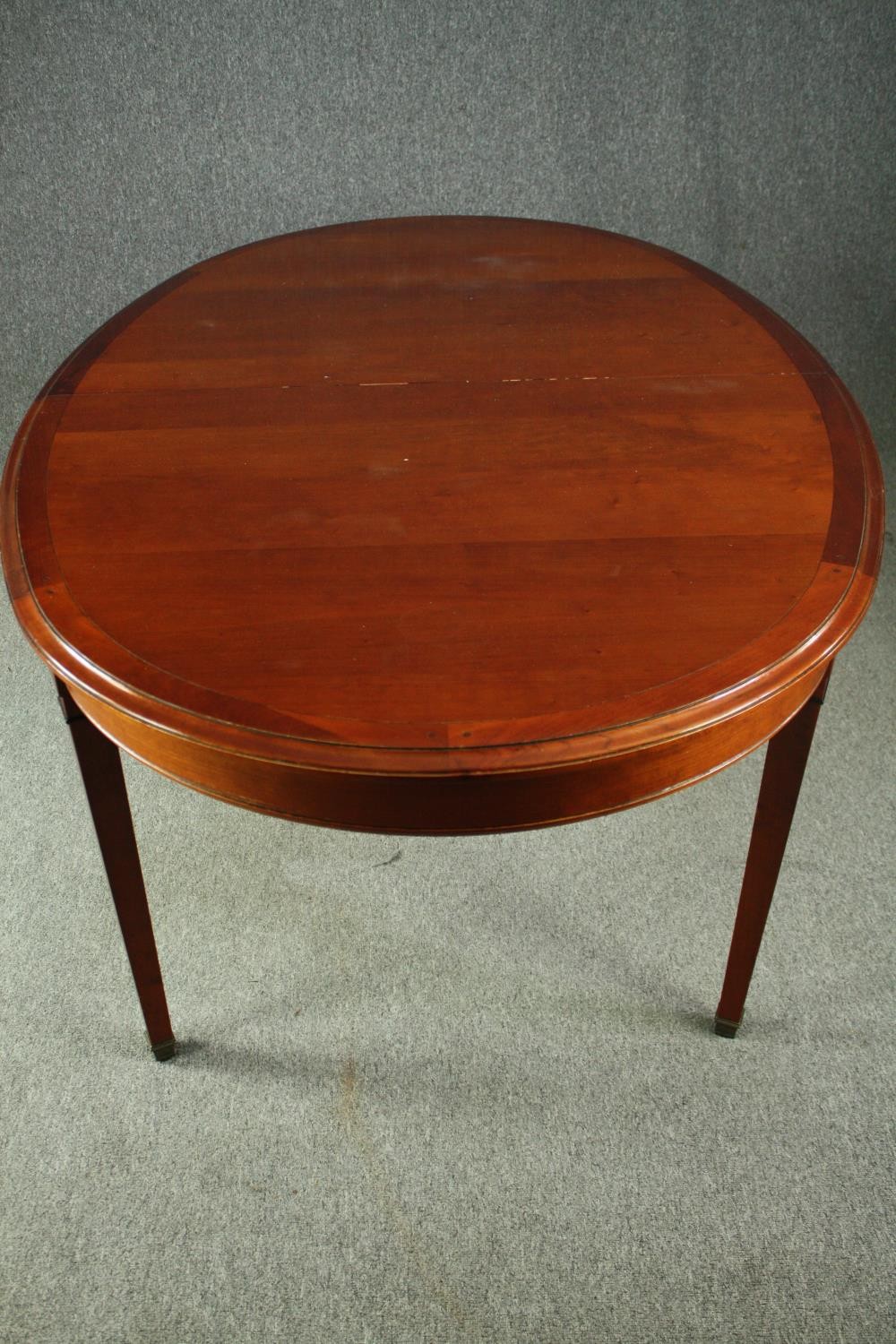 A 19th century style fruitwood extending dining table with two extra leaves by Grange Furniture. H. - Image 5 of 10