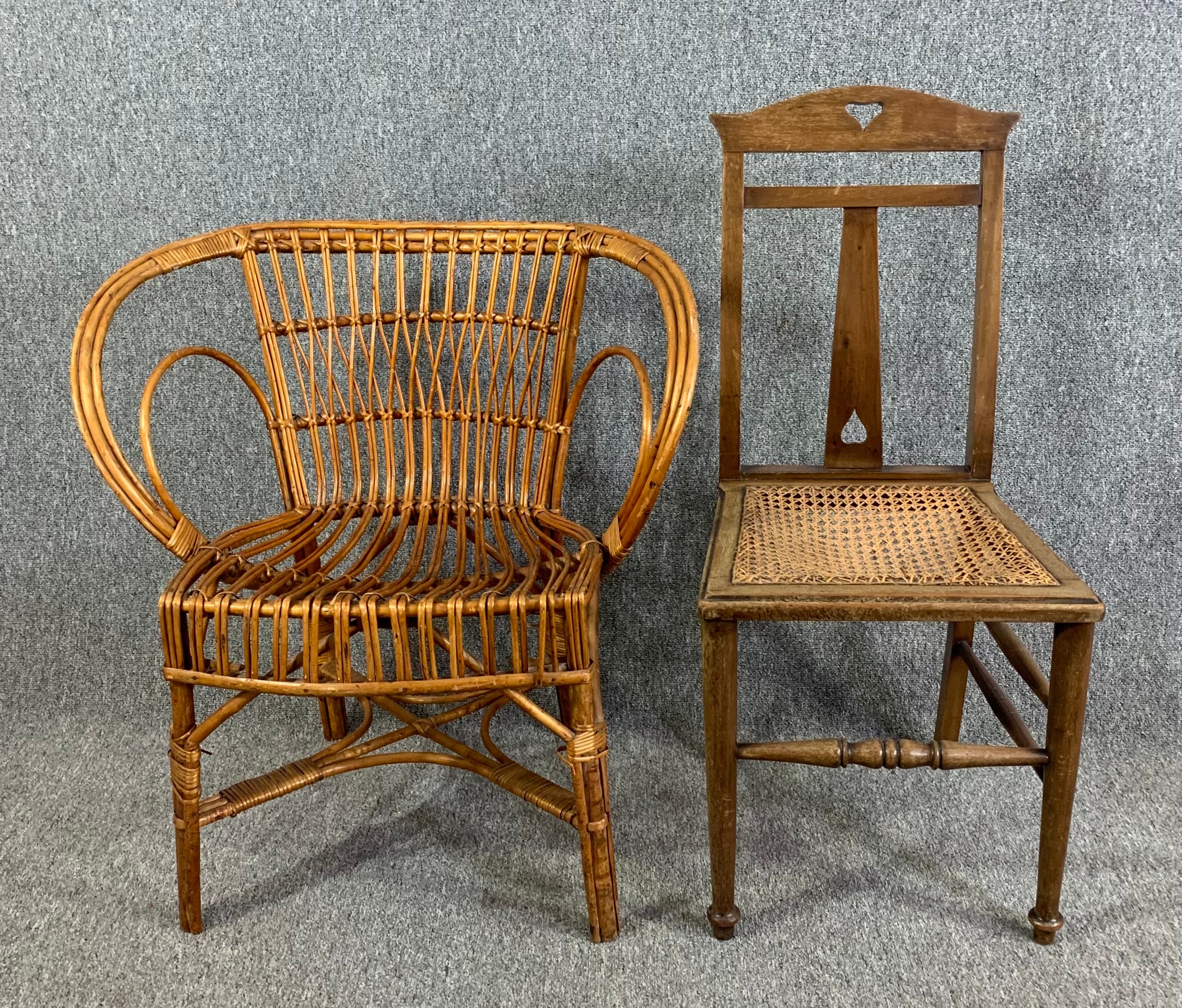 A vintage bamboo conservatory armchair and an oak Arts and Crafts side chair. H.88cm (largest)