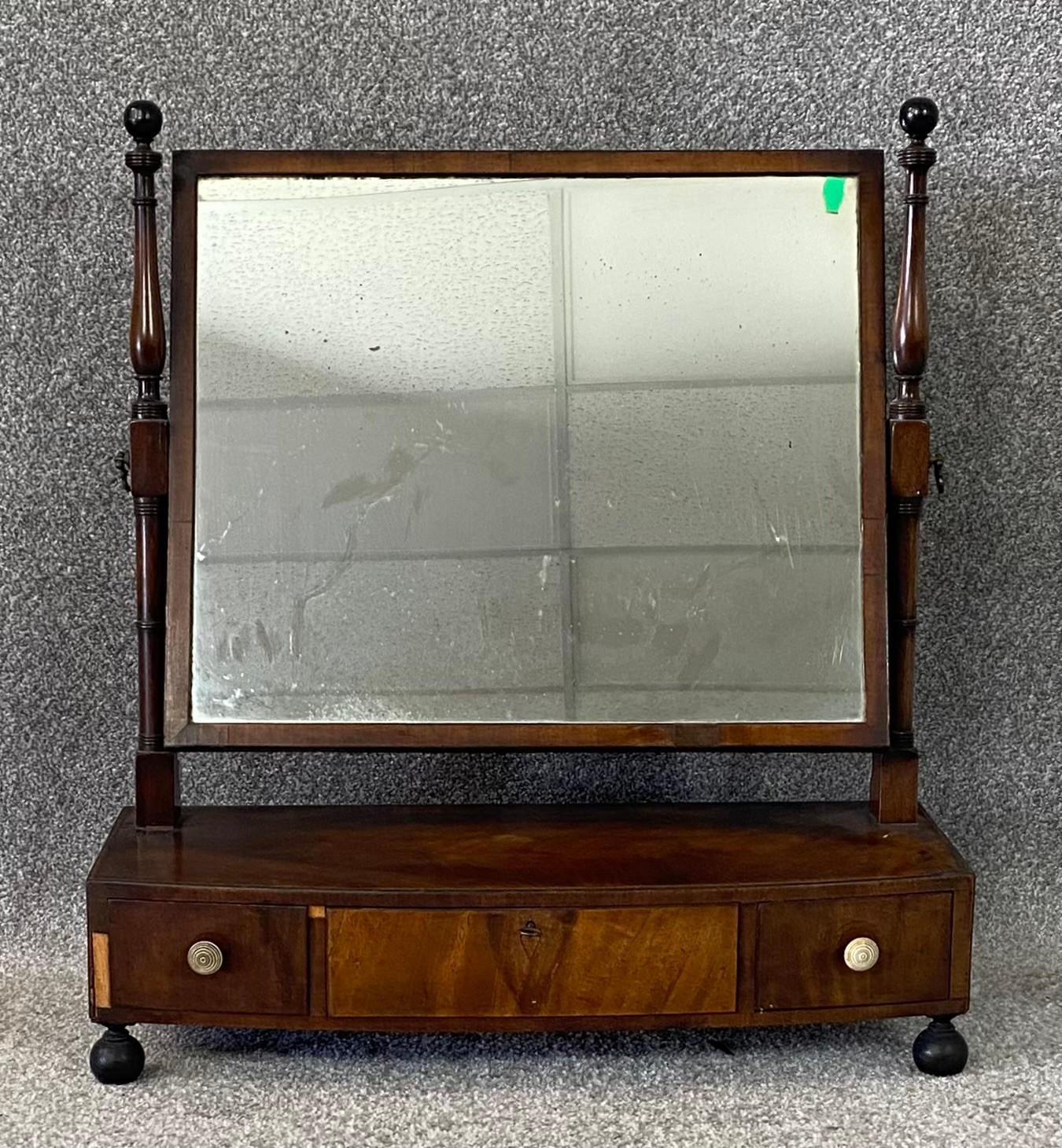 A 19th century mahogany swing frame toilet mirror. H.65 W.60 D.23cm